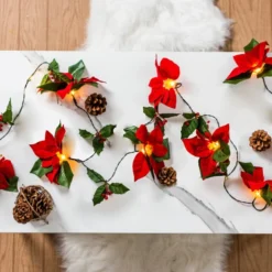 Pre Lit Velvet Silk Poinsettia Garland With Red Berries 6ft 10 Pre Lit Velvet Silk Poinsettia Garland With Red Berries 6ft -Holiday Decor Store Pre Lit Velvet Silk Poinsettia Garland with Red Berries 6ft 5 result 600x600 1